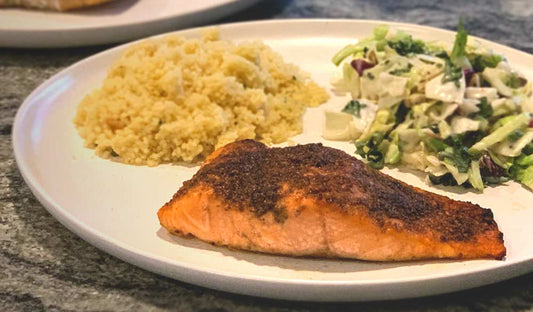 Broiled salmon fillets crusted with Paanch Phoran seeds