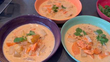 Bowl of creamy Cajun three potato soup