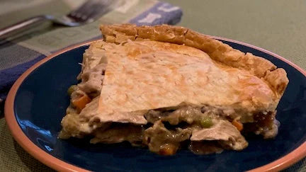 Chicken pot pie with a golden herbed crust